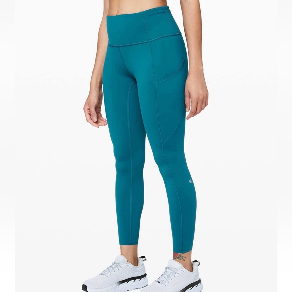 Lululemon blue/teal high waisted leggings size 4